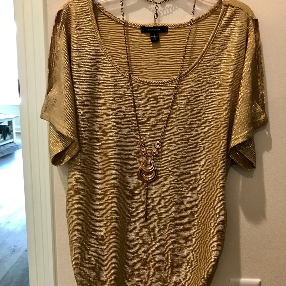 Gold Cold Shoulder Top with attached necklace.